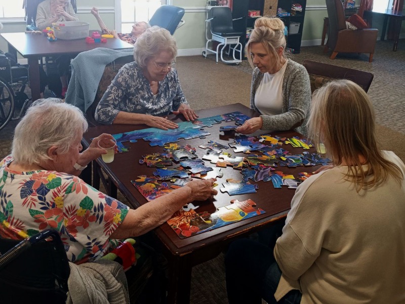 Resident playing dominoes
